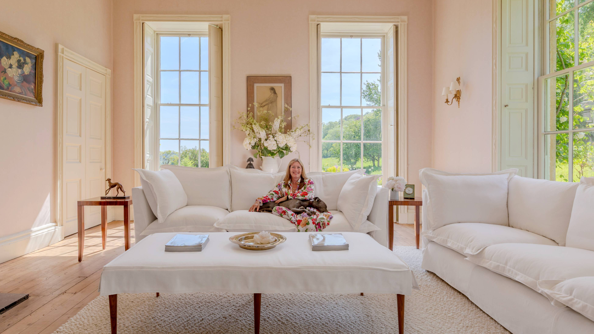 A Coco 3.5 seater sofa in Snowdrop in a light country drawing room