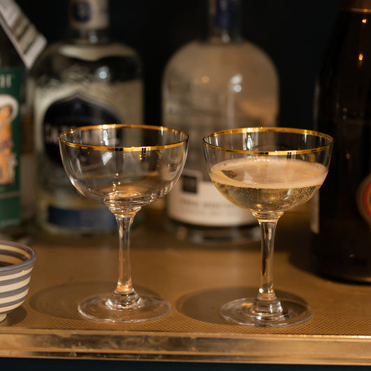 Two Champagne Saucers with Gold Rims by Vintage List