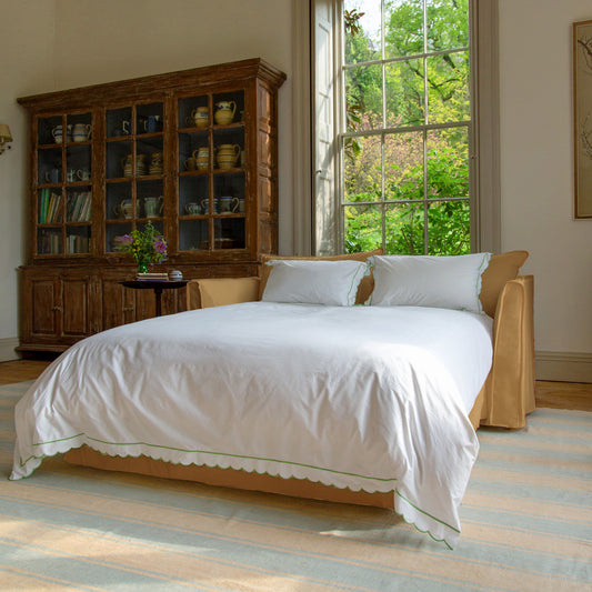 Coco 2.5 seater sofa bed with Self Piped Knife Edge cushion in Cotton Linen Sunflower - Made to Order