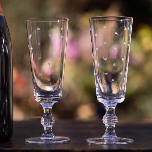 Four Champagne Flutes with Stars Design by Vintage List