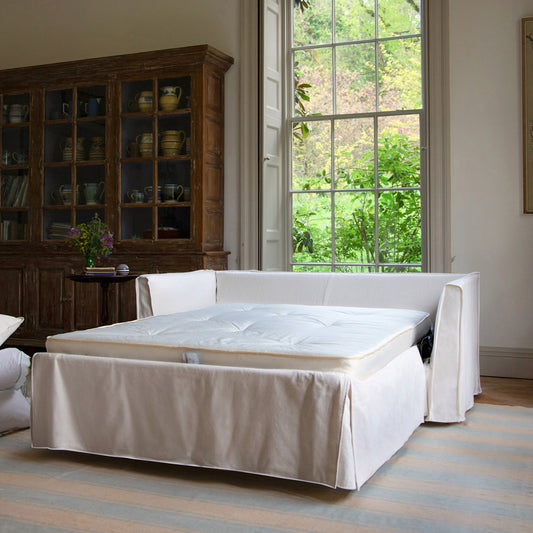Coco 2.5 seater sofa bed with Self Piped Knife Edge cushion in Cotton Linen Snow Drop - Made to Order